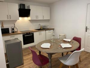 Appartements Le puits du bourg : photos des chambres