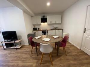 Appartements Le puits du bourg : photos des chambres