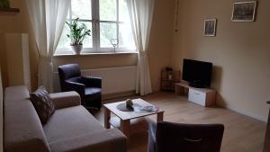Three-Bedroom Apartment room in Stadthotel am Bühnenhaus