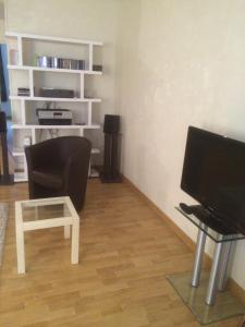 Appartements L'Appartement de la Maison du Theatre Saint Bonnet : photos des chambres