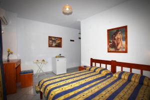 Alexandros Rooms & Studios