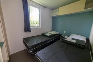 Campings Camping Les Vernieres La Bourboule Sancy : photos des chambres