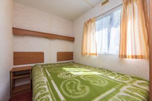 Žaliasis kampas kemperis Šventojoje