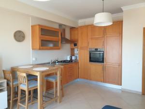 Oura Beach T1 apartment Coral , close to the Strip, Swimming Pool, Wi Fi, AC