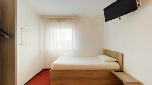 Hotels L'Auberge Everhotel de Tarbes-Ibos : photos des chambres