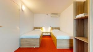 Hotels L'Auberge Everhotel de Tarbes-Ibos : photos des chambres