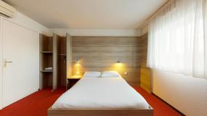 Hotels L'Auberge Everhotel de Tarbes-Ibos : photos des chambres