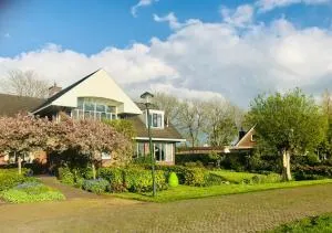 Gastenverblijf Villa Buitenplaats Wergea contactloos inchecken - Warten