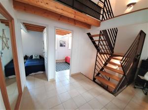 Maisons de vacances Maison de village facon Loft, avec cour et airco, dans le centre historique : photos des chambres