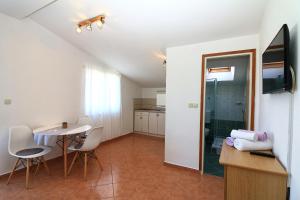 Apartmani i sobe Josica