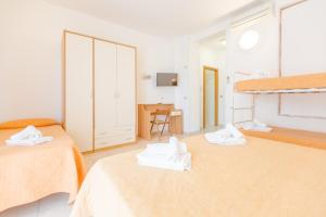 Quadruple Room with Balcony room in Hotel Marylise