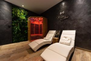 Appartements Le SPA & L'Alcove - Jacuzzi - Sauna - Appart'Hotel SPA - Melina & Alfred : photos des chambres