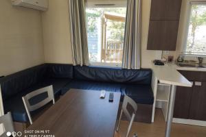 Appartements Mobilhome climatise et ombrage : photos des chambres