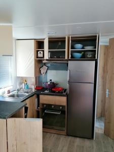 Bungalow confortable à Saint-Julien-en-Born avec piscine partagée