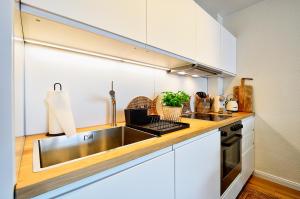 Ferienwohnung Hafenliebe, Villa Vilmblick mit Meerblick