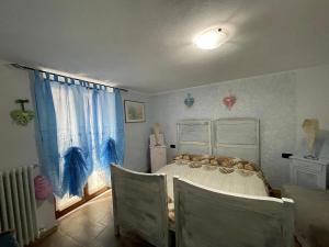 LA CASA DI PUCCI nel borgo affrescato di PARLASCO