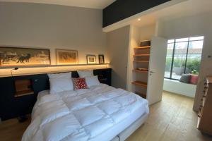 Villas Elegante maison d'architecte, Spa a debordement : photos des chambres
