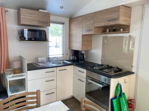 Appartements Mobil Home 3 chambres climatise tout equipe : photos des chambres