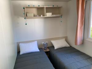 Appartements Mobil Home 3 chambres climatise tout equipe : photos des chambres