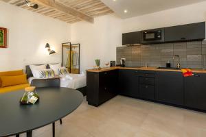 Appart'hotels Provence Au Coeur Appart Hotels : photos des chambres