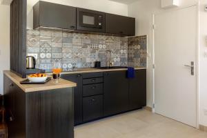 Appart'hotels Provence Au Coeur Appart Hotels : photos des chambres