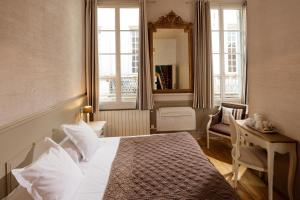 Hotels Hotel De L'Amphitheatre : photos des chambres