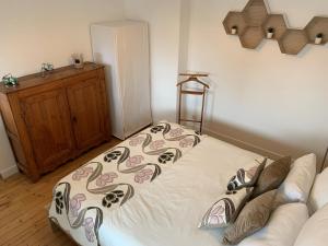 Maisons de vacances L'Annexe, F2 avec jardin, 800 m de la plage : photos des chambres