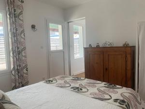 Maisons de vacances L'Annexe, F2 avec jardin, 800 m de la plage : photos des chambres