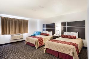 2 Queen Beds Exec Suite Non-Smoking room in Americas Best Value Inn Charlotte