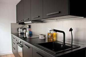 Appartements A stylish apartment in the centre of town : photos des chambres