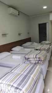 Flat familiar com ar,wi fi,cozinha e garagem