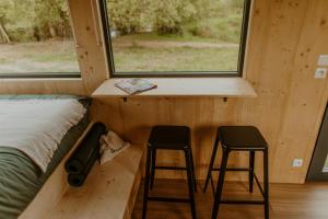 Maisons de vacances Parcel Tiny House I Ferme de Garance : photos des chambres