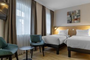 Superior Double or Twin Room with City View room in KONTRAKT Boutique Hotel