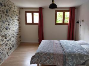 B&B / Chambres d'hotes Gite Les Pieds dans l'Olt - Ultreia : photos des chambres