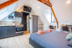 Appartements Studios Neufs -Tout Confort - Lorient Centre - Stationnement Facile : photos des chambres