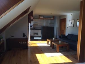 Attic loft to wake up by the sea.