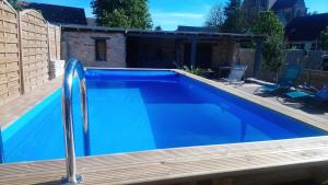 Maisons de vacances Gitelabaronnaise avec piscine chauffee pres parc Asterix : photos des chambres