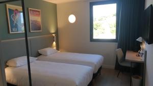 Hotels Kyriad Bordeaux Nord Sainte Eulalie : photos des chambres