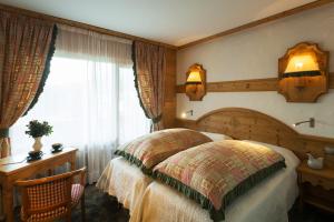 Hotels Chalet-Hotel Neige et Roc, The Originals Relais (Hotel-Chalet de Tradition) : photos des chambres