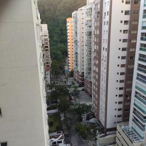 Apartamento Dulce Pitangueiras Guarujá com varanda