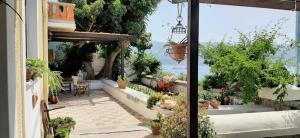 Holiday Dreamy Art Cottage with private courtyard and sea view Samos Greece