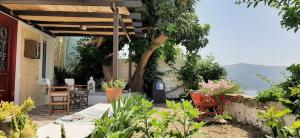 Holiday Dreamy Art Cottage with private courtyard and sea view Samos Greece