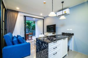 Apartment at Palmyrah Surin by Lofty
