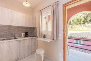 Studio Apartments Swimming Pool and sea view on Pelekas Beach