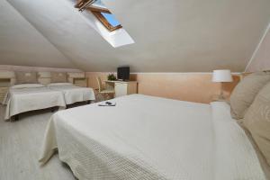 Economy Triple Room room in Hotel Vienna Ostenda e Ristorante il Danubio