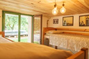 Maisons d'hotes Roofless Surf Lodge : Lit dans un dortoir de 4 lits