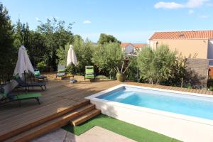 Appartements Le Terracotta , 2chambres, Terrasse, Piscine, Parking gratuit, Wifi, Climatisation : photos des chambres