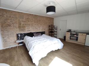 Appart'hotels Appartement Jarnioux - Les Meubles des Pierres Dorees : photos des chambres