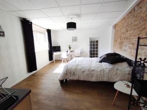 Appart'hotels Appartement Jarnioux - Les Meubles des Pierres Dorees : photos des chambres