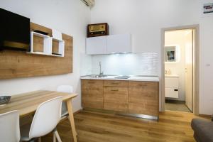 STREET BUZZ OLD TOWN APARTMENT by DuHomes